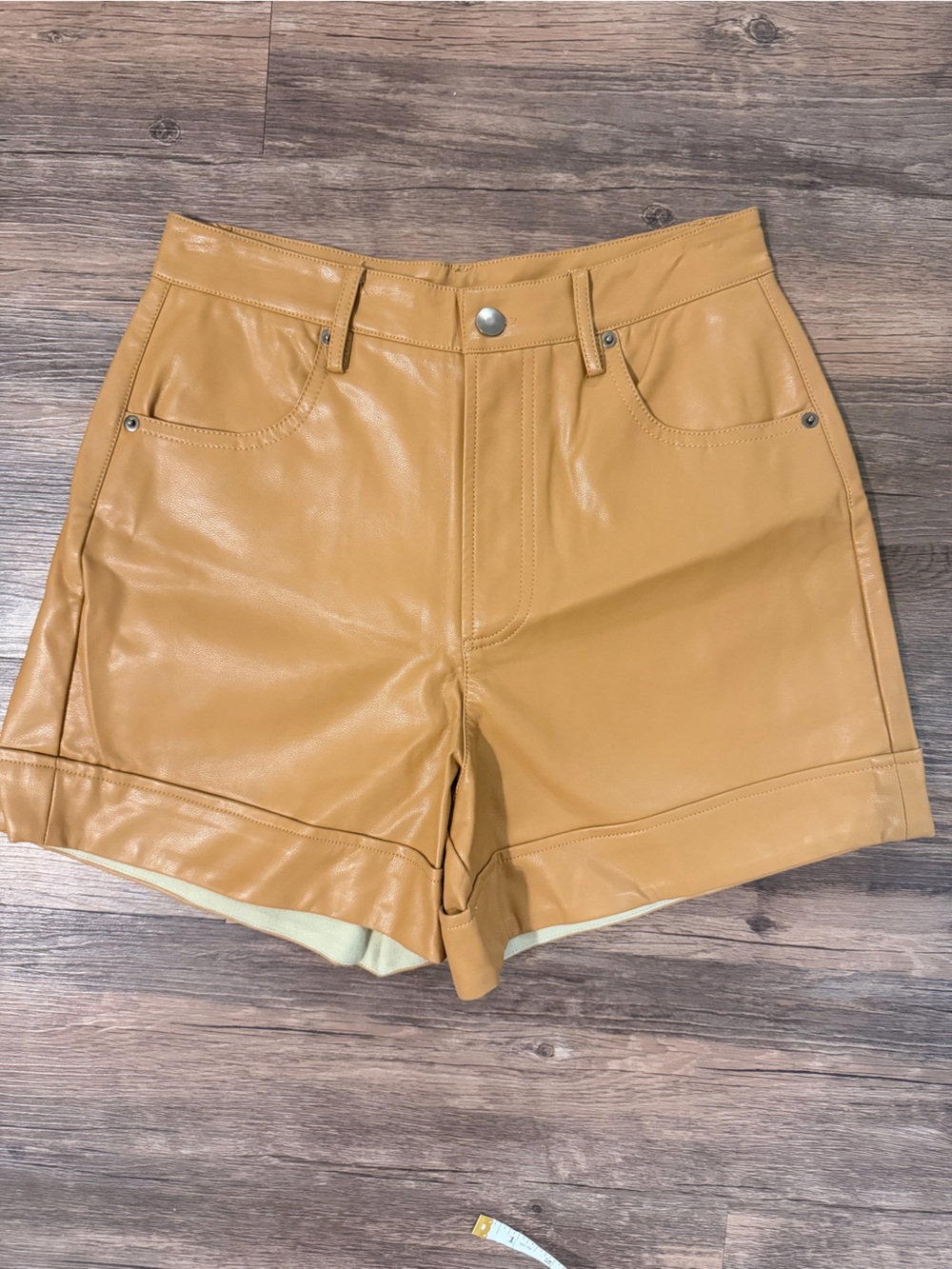 Olivaceous High-Rise Faux Leather Shorts in Tan size Medium